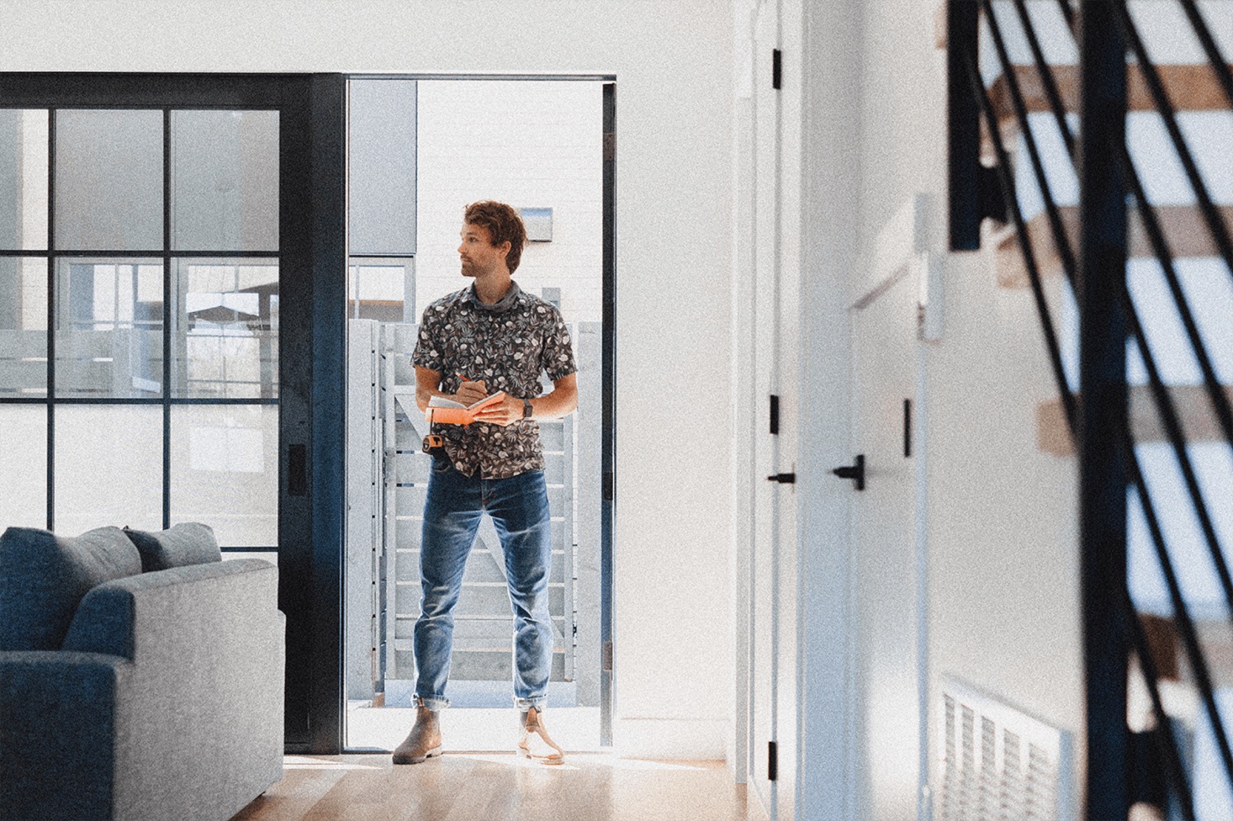  A detail photo of a man making a detailed checklist. If you're looking for the best home concierge in Colorado to help you upgrade and maintain your home, WillowHome is here for you. 